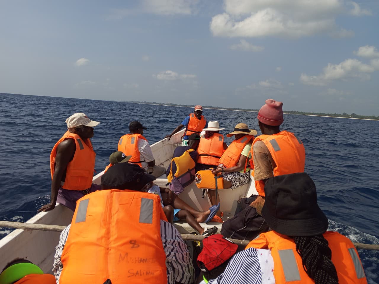 Family enjoying boatride during sea to table fishing tour